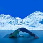 Maintaining Spine Health While Travelling: How Yoga Wheel Practice Supports Frequent Flyers