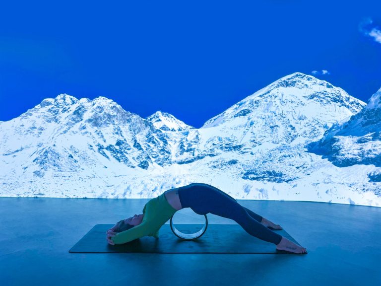 Maintaining Spine Health While Travelling: How Yoga Wheel Practice Supports Frequent Flyers